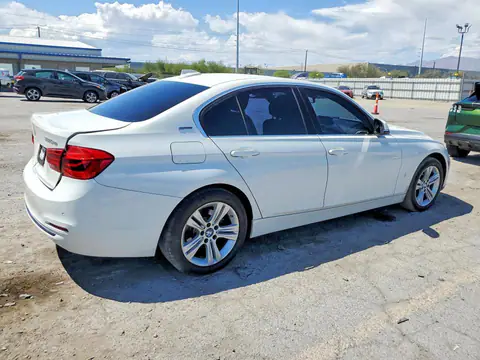 WBA8E1C3XHA029881 — 2017 BMW 330E, photo 3 from Copart 29.09.2026, Side