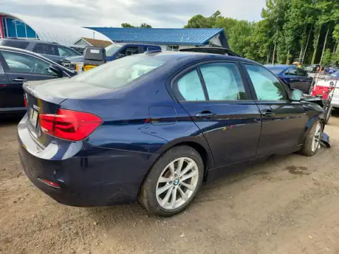 WBA8E5G30HNU43472 — 2017 BMW 3ER, photo 3 from Copart, Front end