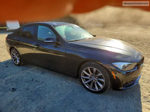 WBA8A3C5XHK691429 — 2017 BMW 3ER, photo 4 from Copart, Side