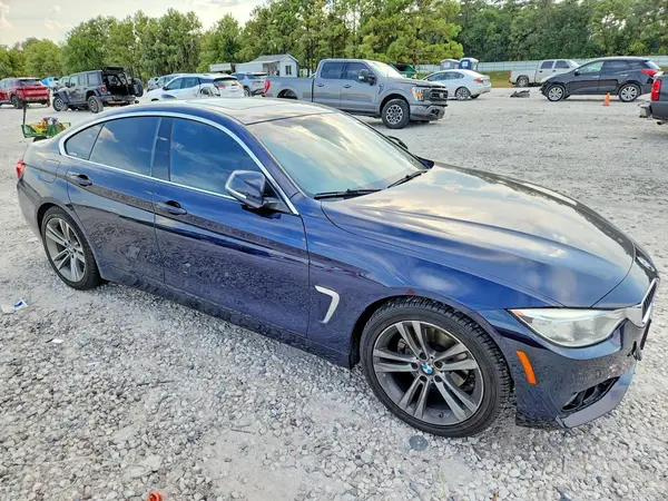 WBA4A9C5XGG508338 — 2016 BMW 4ER, photo 4 from Copart, Front end