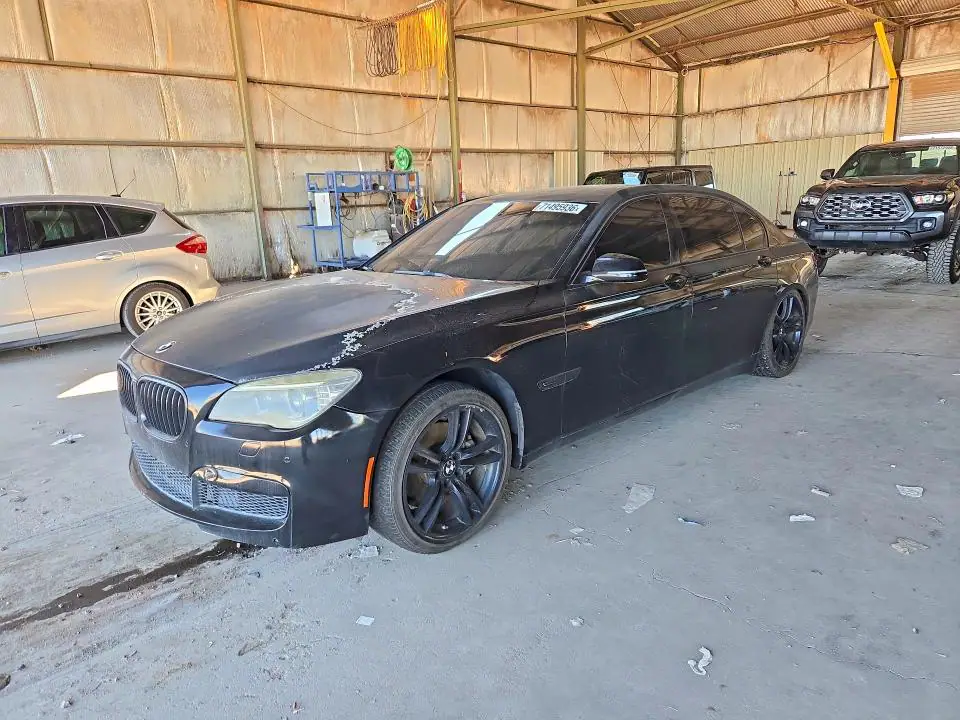 2014 BMW 740 VIN WBAYE4C50ED138024 фото 1