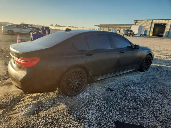 WBA7F0C59HGM21056 — 2017 BMW 7ER, photo 3 from Copart, Minor dents and scratches