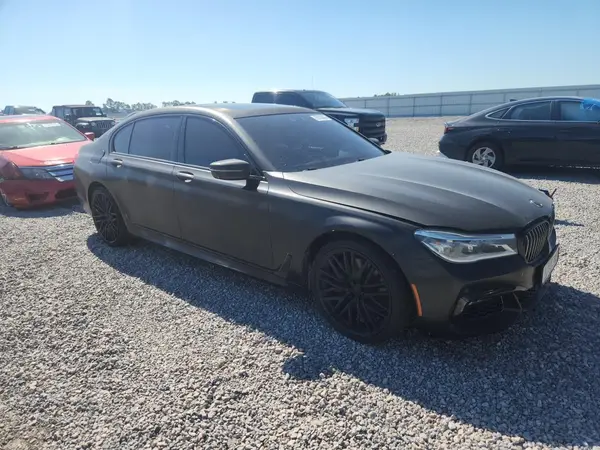 WBA7F0C59HGM21056 — 2017 BMW 7ER, photo 4 from Copart, Minor dents and scratches