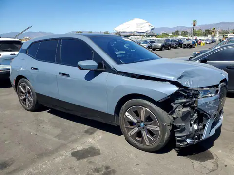 WB523CF02RCP34414 — 2024 BMW iX, foto 4 de Copart 19.10.2026, Parte delantera
