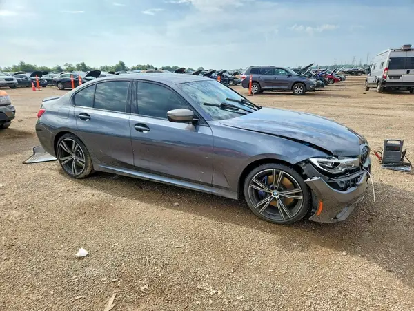 3MW5U9J01M8B50186 — 2021 BMW M3, photo 4 from Copart, Front end