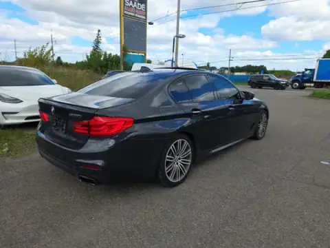 WBAJB9C56JG463728 — 2018 BMW M5, zdjęcie 4 z Copart 14.10.2026, Drobne wgniecenia i rysy