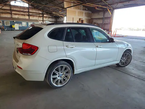 2015 BMW X1 VIN WBAVM5C5XFVV94491 фото 3