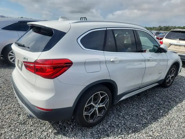 WBXHT3C32GP889972 — 2016 BMW X1, фото 3 с аукциона Copart 02.10.2026, Передняя часть