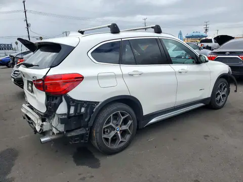 WBXHT3C34G5E51596 — 2016 BMW X1, photo 3 from Copart 19.10.2026, Front end