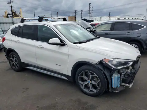 WBXHT3C34G5E51596 — 2016 BMW X1, photo 4 from Copart 19.10.2026, Front end