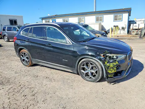 WBXHT3C37H5F69319 — 2017 BMW X1, foto 4 de Copart 26.10.2026, Parte delantera