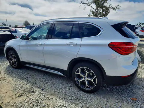 WBXHT3C39J5L28204 — 2018 BMW X1, foto 2 de Copart 20.10.2026, Parte trasera