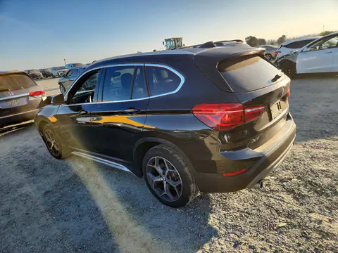 WBXHT3C32J5L28965 — 2018 BMW X1, foto 2 de Copart 27.10.2026, Parte delantera
