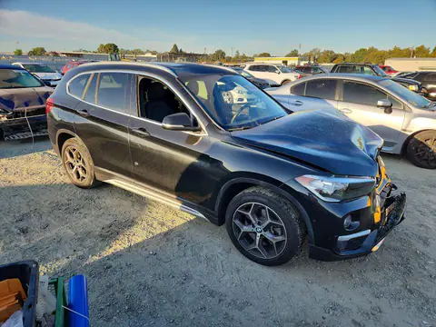 WBXHT3C32J5L28965 — 2018 BMW X1, foto 4 de Copart 27.10.2026, Parte delantera