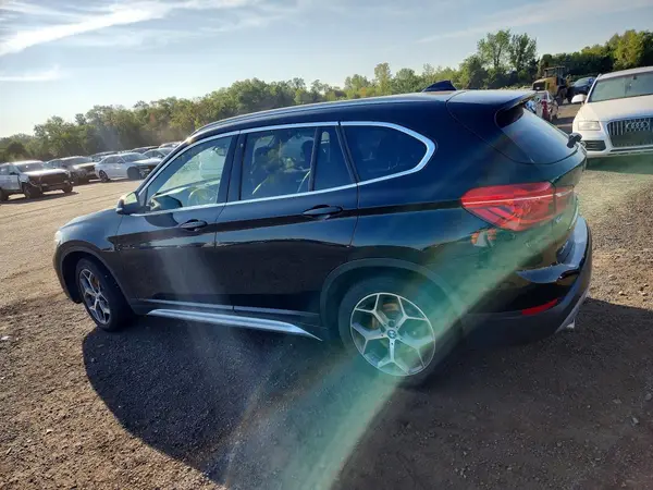 WBXHT3C38J3F03833 — 2018 BMW X1, photo 2 from Copart, Flood