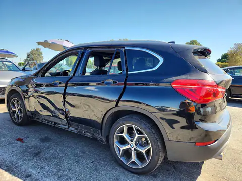 WBXHT3C31J5K24662 — 2018 BMW X1, фото 2 з Copart 27.10.2026, Бокова частина