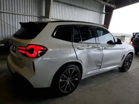 WBX57DP02NN149134 — 2022 BMW X3, ფოტო 3, Copart 21.09.2026, გვერდითი ნაწილი