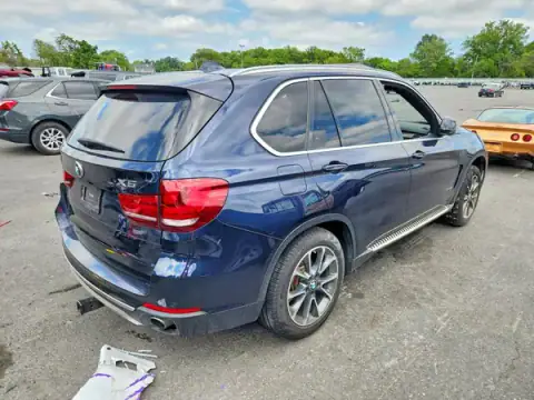 5UXKR0C35H0V73183 — 2017 BMW X5, photo 3 from Copart 06.10.2026, Side
