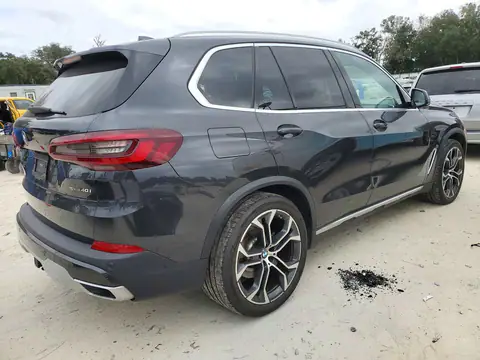5UXCR4C01M9F09913 — 2021 BMW X5, foto 3 de Copart, Lateral
