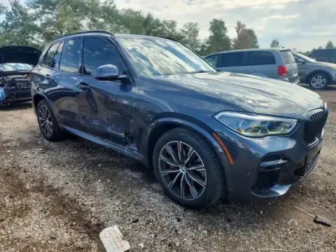 5UXCR6C08N9K65641 — 2022 BMW X5, photo 4 from Copart, Side