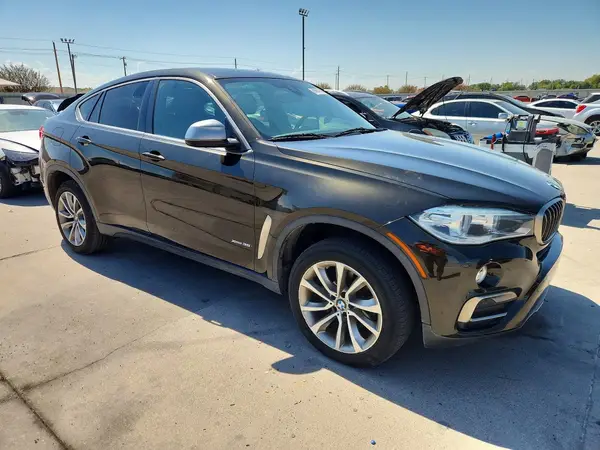 5UXKU2C57J0X49975 — 2018 BMW X6, photo 4 from Copart 05.10.2026, Minor dents and scratches