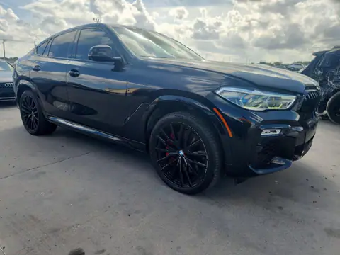 5UXCY8C05M9F67498 — 2021 BMW X6, foto 4 de Copart, Pequeñas abolladuras y arañazos
