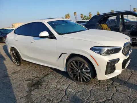5UXCY6C00P9P28331 — 2023 BMW X6, фото 4 з Copart, Незначні вм’ятини й подряпини