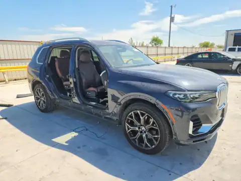 5UXCW2C07L9A03854 — 2020 BMW X7, photo 4 from Copart, Side