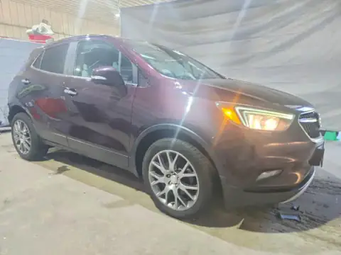 KL4CJ1SB1JB597979 — 2018 Buick Encore, zdjęcie 4 z Copart 06.10.2026, Tył