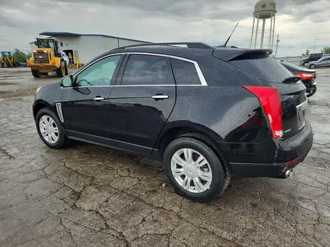 2014 CADILLAC SRX VIN 3GYFNAE37ES588218 фото 2