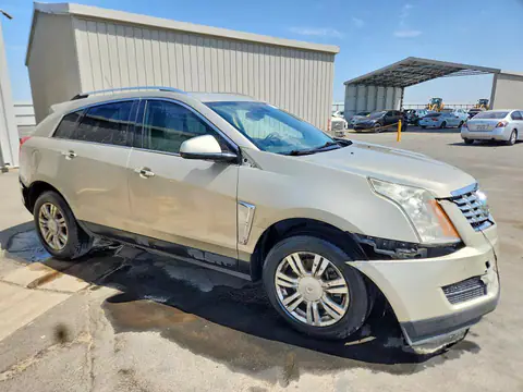 2015 CADILLAC SRX VIN 3GYFNBE34FS584635 фото 4