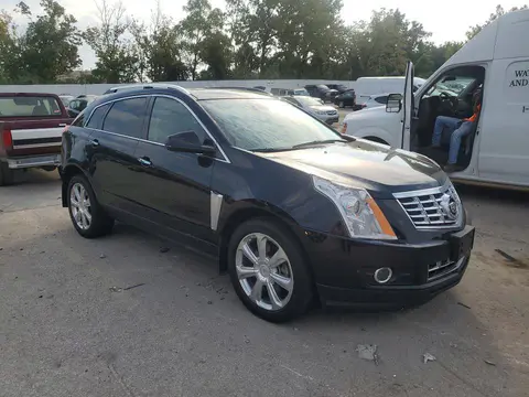 2015 CADILLAC SRX VIN 3GYFNCE3XFS619507 фото 4