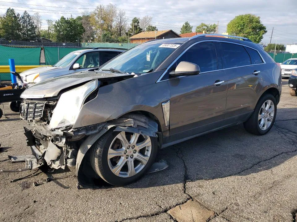 2015 Cadillac SRX VIN 3GYFNGE38FS522278 фото 1