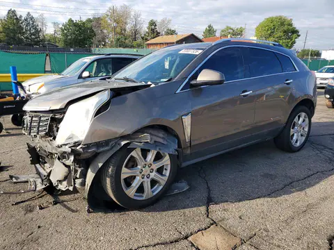 2015 Cadillac SRX VIN 3GYFNGE38FS522278 фото 1