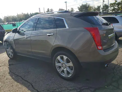 2015 Cadillac SRX VIN 3GYFNGE38FS522278 фото 2