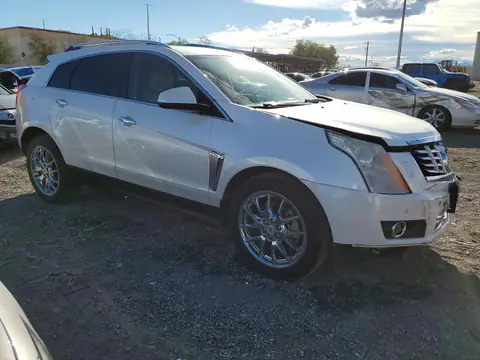 2015 Cadillac SRX VIN 3GYFNCE34FS529558 фото 4