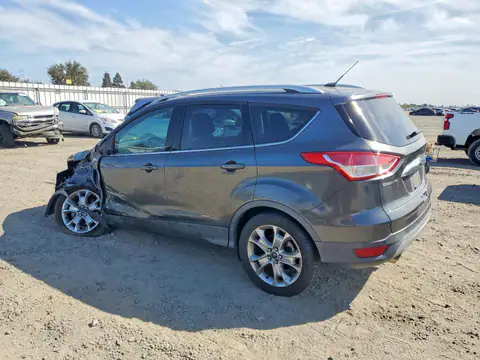 2015 Ford Escape VIN 1FMCU0JX7FUB49869 фото 2