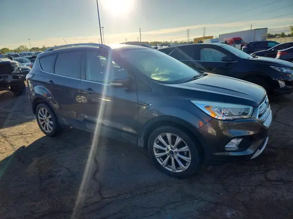 1FMCU0JD5HUD38237 — 2017 Ford Escape, photo 4 from Copart 02.10.2026, Side