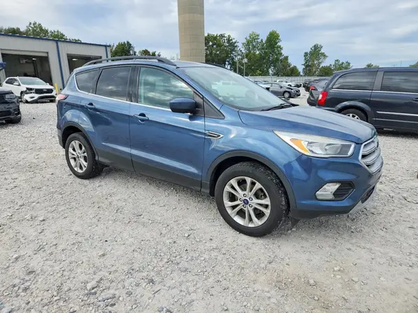 1FMCU0GD0JUC68885 — 2018 Ford Escape, photo 4 from Copart, Side