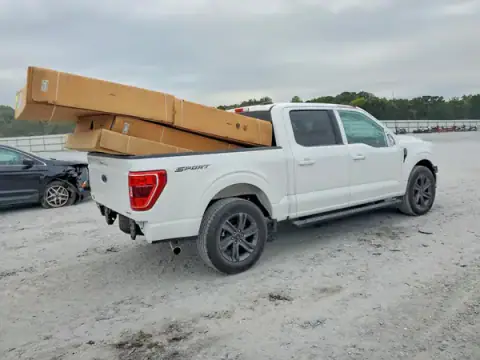 1FTEW1CP6PKF52099 — 2023 Ford F-150, photo 3 from Copart, Front end