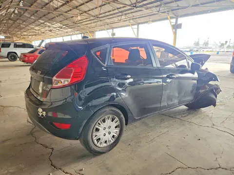 2017 Ford Fiesta VIN 3FADP4TJ1HM104374 фото 3
