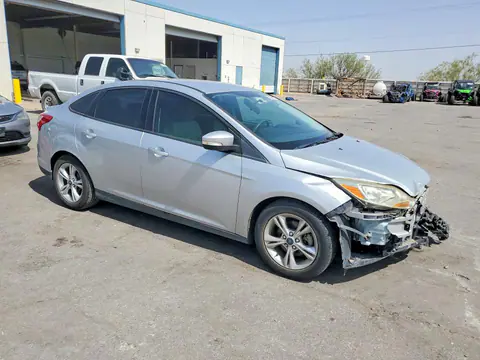 2014 Ford Focus VIN 1FADP3F27EL110305 фото 4