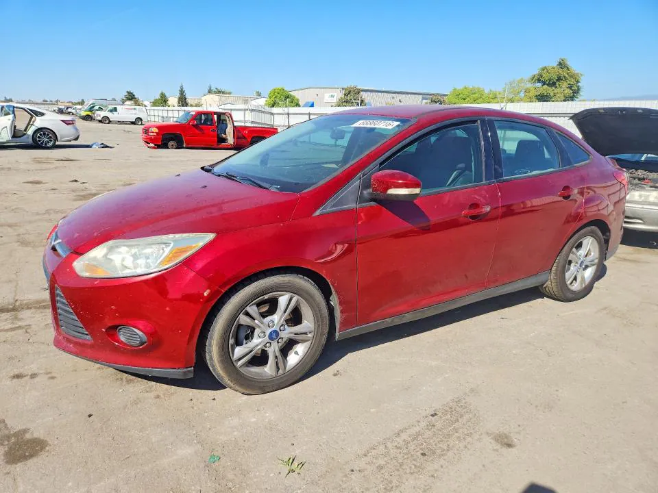 2014 Ford Focus VIN 1FADP3F22EL210649 фото 1