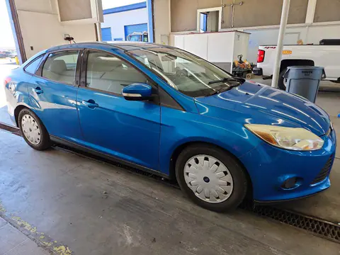 2014 Ford Focus VIN 1FADP3F22EL219741 фото 4