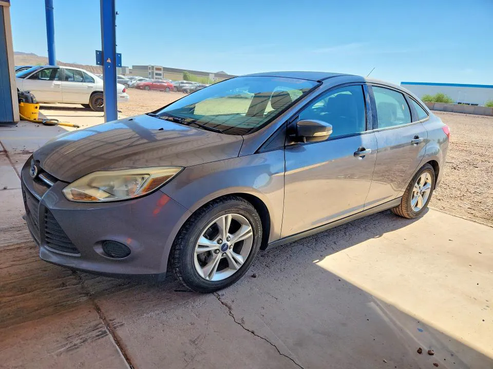 2014 Ford Focus VIN 1FADP3F2XEL129592 фото 1