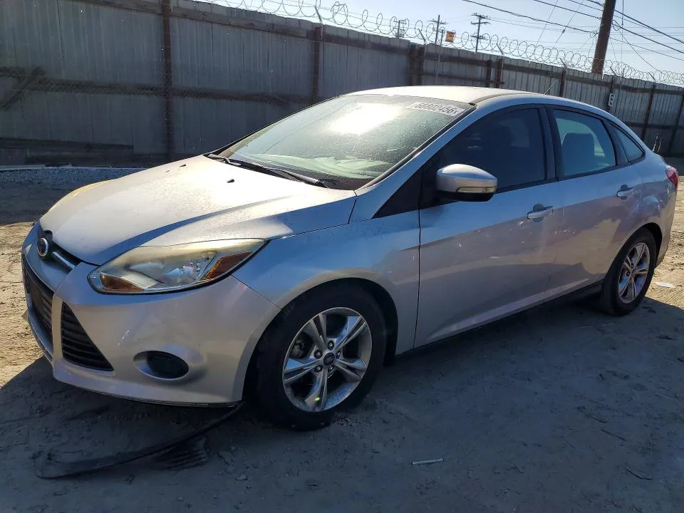 2014 Ford Focus VIN 1FADP3F29EL144309 фото 1