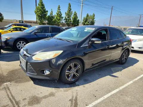 2014 Ford Focus VIN 1FADP3F20EL391265 фото 1
