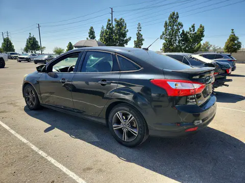 2014 Ford Focus VIN 1FADP3F20EL391265 фото 2