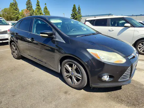 2014 Ford Focus VIN 1FADP3F20EL391265 фото 4