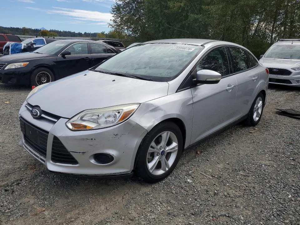 2014 Ford Focus VIN 1FADP3F29EL211216 фото 1